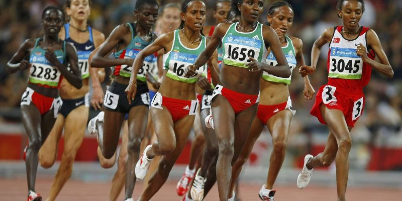Dibaba of Ethiopia and Abeylegesse of Türkiye lead the pack in the women’s 5000m final at the Beijing 2008 Olympic Games